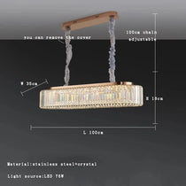 Gio crystal dining chandelier shown in a compact size over a round table