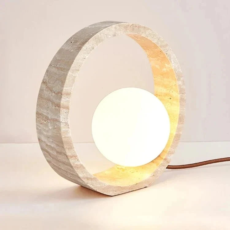 Modern travertine LED table lamp on a desk