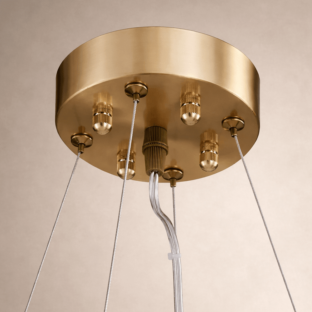 Oakley marble chandelier warm glow through natural stone
