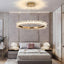 Capri brushed gold crystal ring ceiling light over a dining table