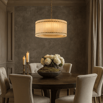 Valmont 24-inch round marble chandelier illuminated