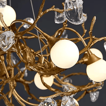 Albero sculptural gold chandelier in a dining room