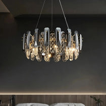 Lazzo crystal chandelier refracting light in a living room