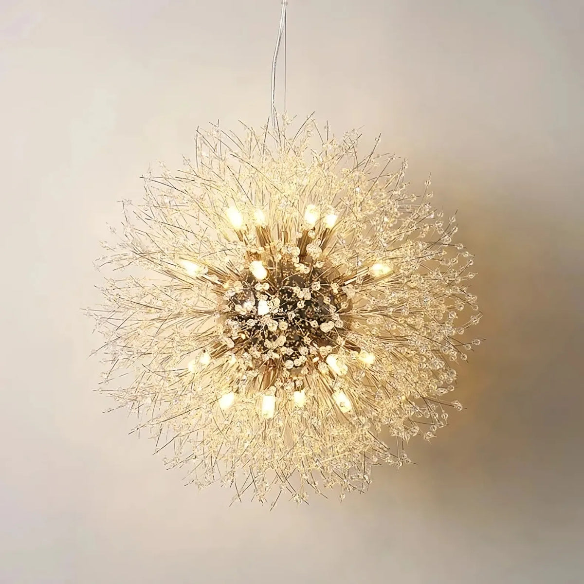 The El Sol crystal dandelion from Morsale.com reflecting colorful light around the room, clear crystals on a steel frame.