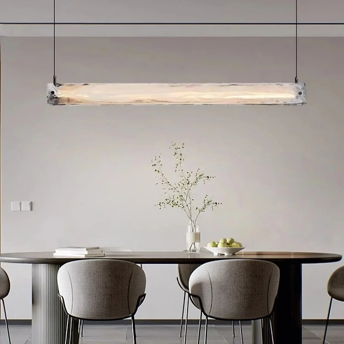 Costa linear glass suspension chandelier over a dining table Main image