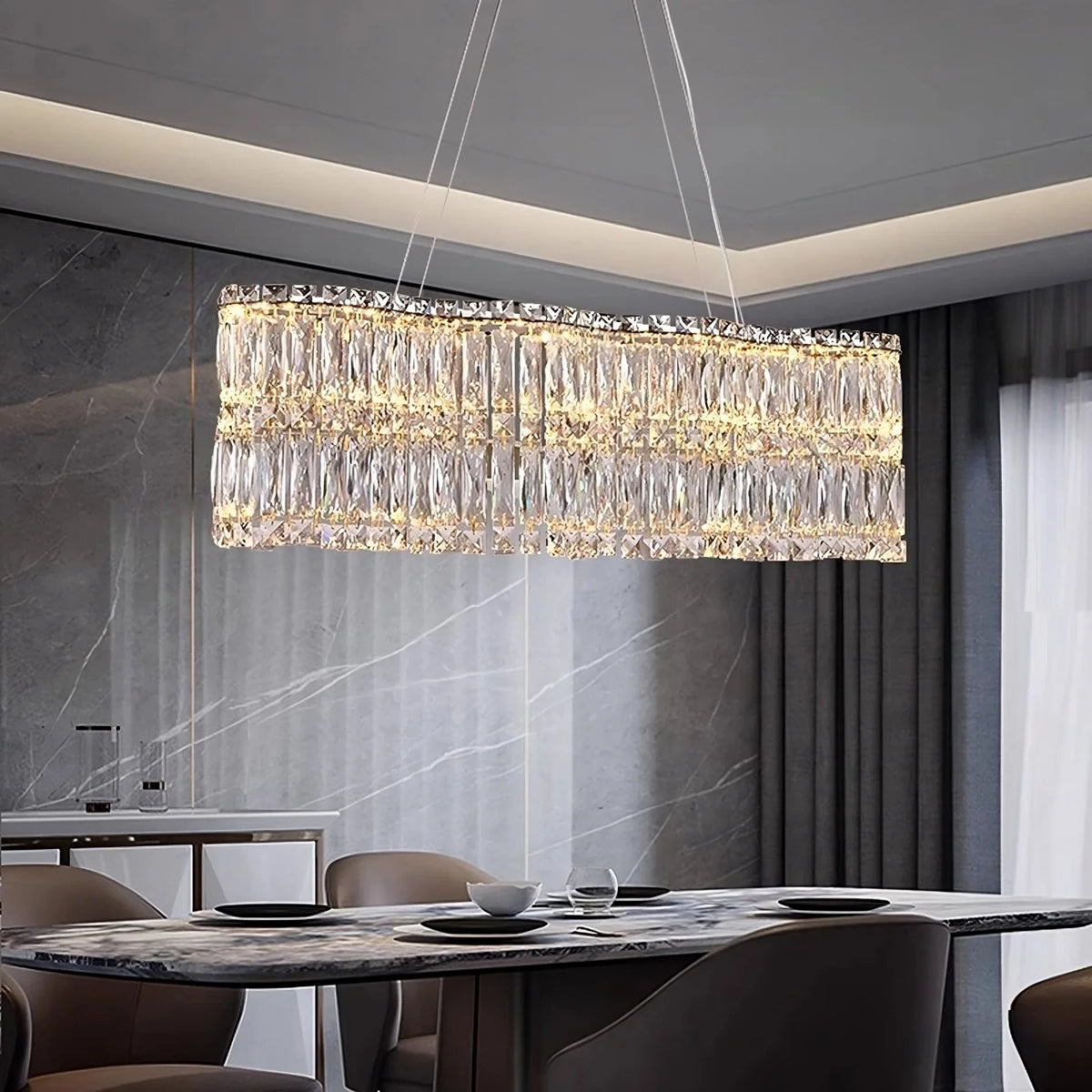 Bacci 39-inch linear crystal dining chandelier over a table Main image