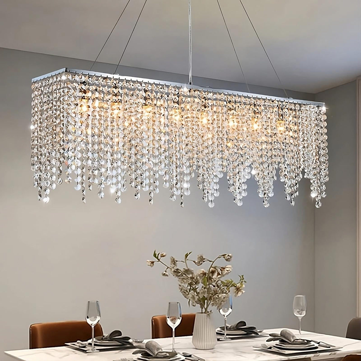 Adena crystal tassel dining chandelier over a dining table Main image