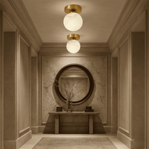 Soria marble flush mount glowing on a ceiling