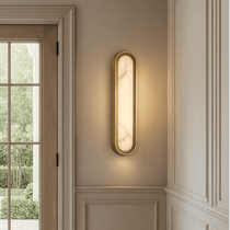 Solari natural marble and brass wall sconce full view