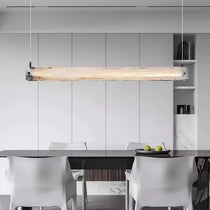 Minimalist glass shade on the Costa linear suspension light