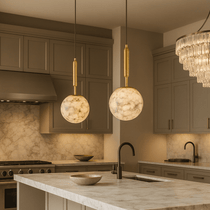 Solara marble orb pendant illuminated with a soft glow