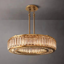 Detail of crystal prisms and brass on the Romano chandelier