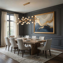 Albero brass branch chandelier illuminated above a dining table