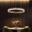 Capri crystal ring chandelier with K9 prisms and steel frame in a living room