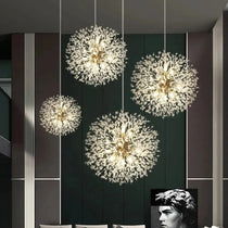 Detail of clear crystal tips on the El Sol dandelion's stainless steel arms, from Morsale.com.