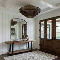 Detail of hand-cast smoke glass on the Riviera flush mount