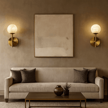 Aria sconce casting up and down light on a wall