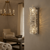 Bacci brass and crystal wall sconce illuminated