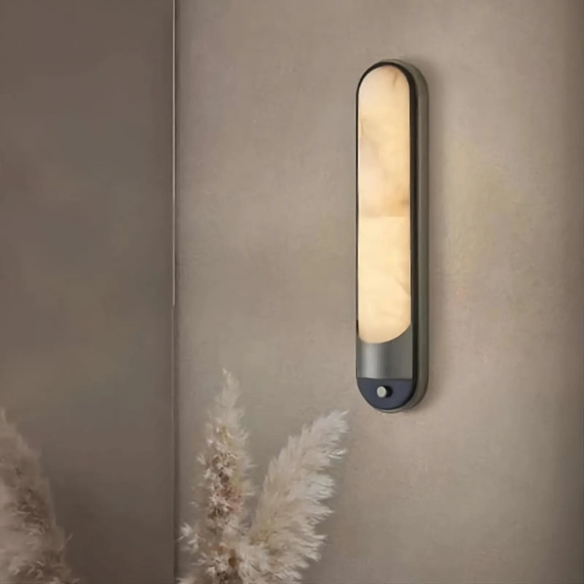 Sandford marble and stainless steel wall sconce in a hallway Main image