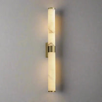 Close-up of the brass accent on the Altura marble sconce